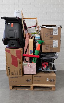 a pile of luggage sitting on top of a pile of boxes