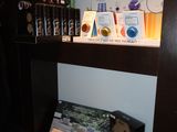 a shelf that has a lot of different items on it