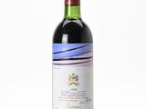 a bottle of wine that is sitting on a table