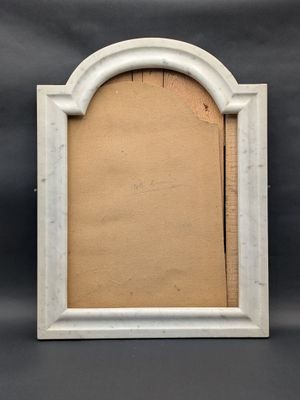 an old picture frame with a picture in it on a black background