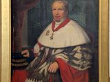 tableau représentant le portrait d'un homme vêtu d'une robe blanche et d'une cape rouge