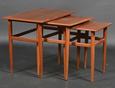a set of three danish teak nesting tables