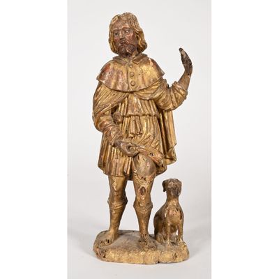 a gold statue of a man with a dog on a white background