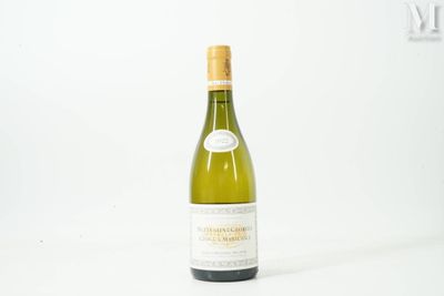 a bottle of wine that is sitting on a table