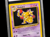 a close up of a pokemon card in a plastic case