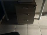 an image of a desk with a computer on it
