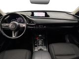 the interior of a car with a steering wheel, dashboard, and dash board