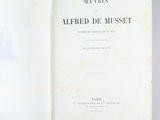 an open book with a picture of a man on it