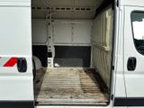 a white van that has a ramp in the back of it