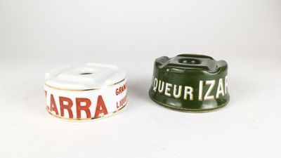 pair of green and white ceramic salt and pepper shakers