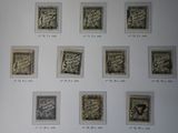 many different types of stamps displayed on the wall