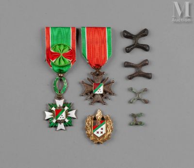 a group of medals including a cross, medal, and other items