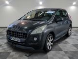 la photo d'une voiture grise garée dans un garage