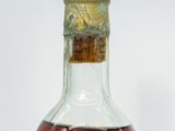 a bottle of liquor that is sitting on a table