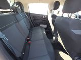 the back seats of a car with a seat belt in the back