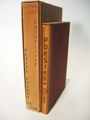 two books that are sitting side by side on a table