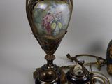 a lot of antique items that are sitting on a table