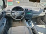 a picture of a car dashboard with a steering wheel