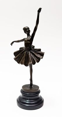 bronze statue of a ballerina on a pedestal on a white background