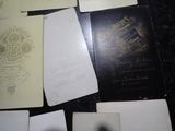 a lot of papers that are sitting on a table