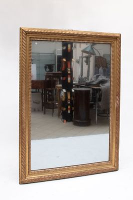 Miroir rectangulaire en bois et stuc doré, bordure à canaux … - Photo 1