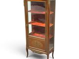 an image of a display cabinet with a glass door
