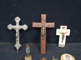 a lot of religious items that are on a table