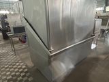 an image of a large stainless steel refrigerator in a warehouse