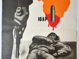 a poster with a man holding a gun next to a bullet