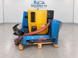 a blue and yellow machine sitting on top of a wooden pallet