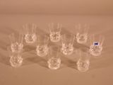 a lot of glasses that are sitting on a table