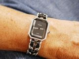 a close up of a person ' s wrist with a watch on it