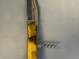 a knife that is laying on top of a table
