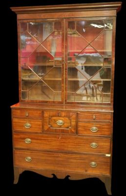 Commode-bibliothèque en acajou et placage d'acajou, ouvrant …