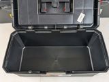 a black tool box that is open on a table