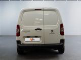 a white van that is parked in a room
