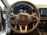 the interior of a car with a steering wheel and dashboard controls