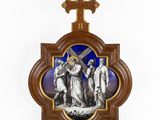 a wooden cross with a picture of jesus on it
