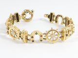 une photo d'un bracelet en or orné de pierres multicolores