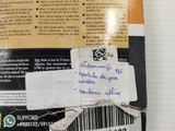 a book with a sticker on it sitting on a table