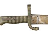 a very old knife that is on display on a white background