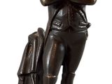 statue of a man with a hat and a backpack on a white background