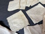 a pile of white handkerchiefs on a table