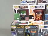 a lot of batman pop vinyl figures in the box