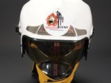 a close up of a helmet on a black surface