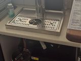 a kitchen with a sink and a faucet on the counter