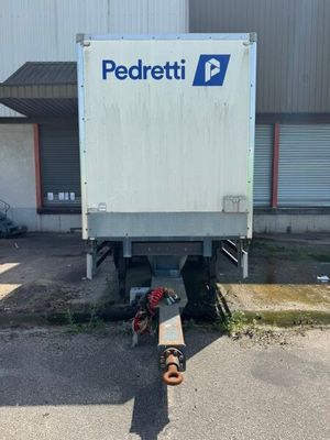 a truck that is parked in front of a building