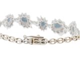 a close up of a bracelet on a white background
