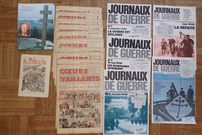 a lot of old french newspapers on the floor