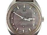an image of a close up of a wrist watch on a white background